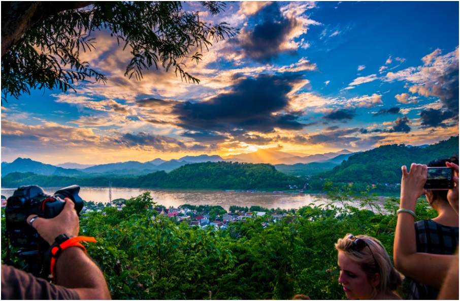 Watch the sunset from Mount Phou Si